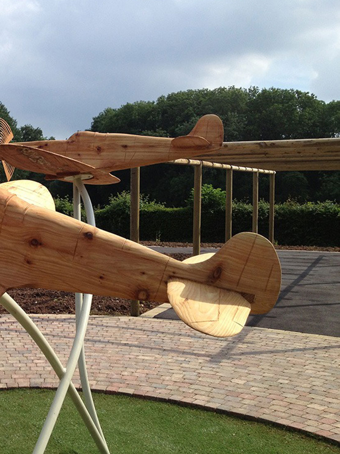 Carved wooden spitfires by Matthew Crabb