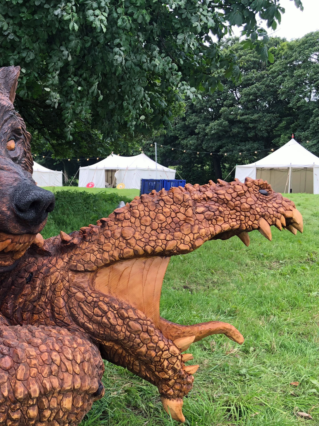 Bear snake head carving