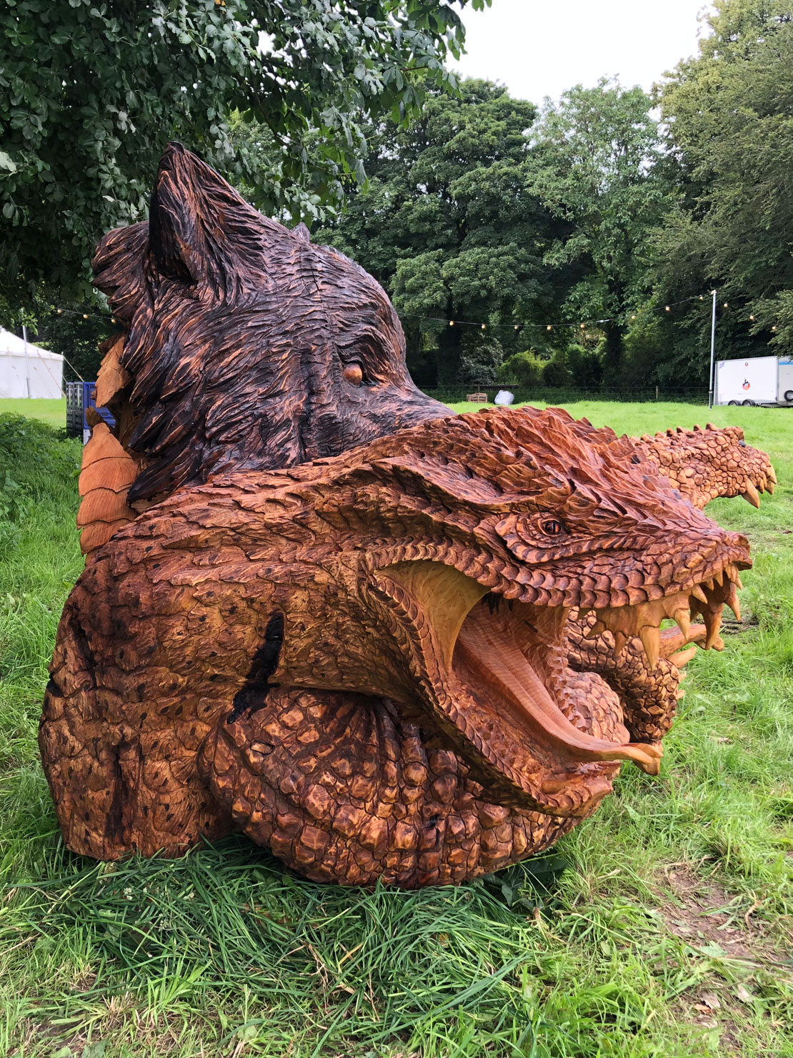 Bear snake head carving