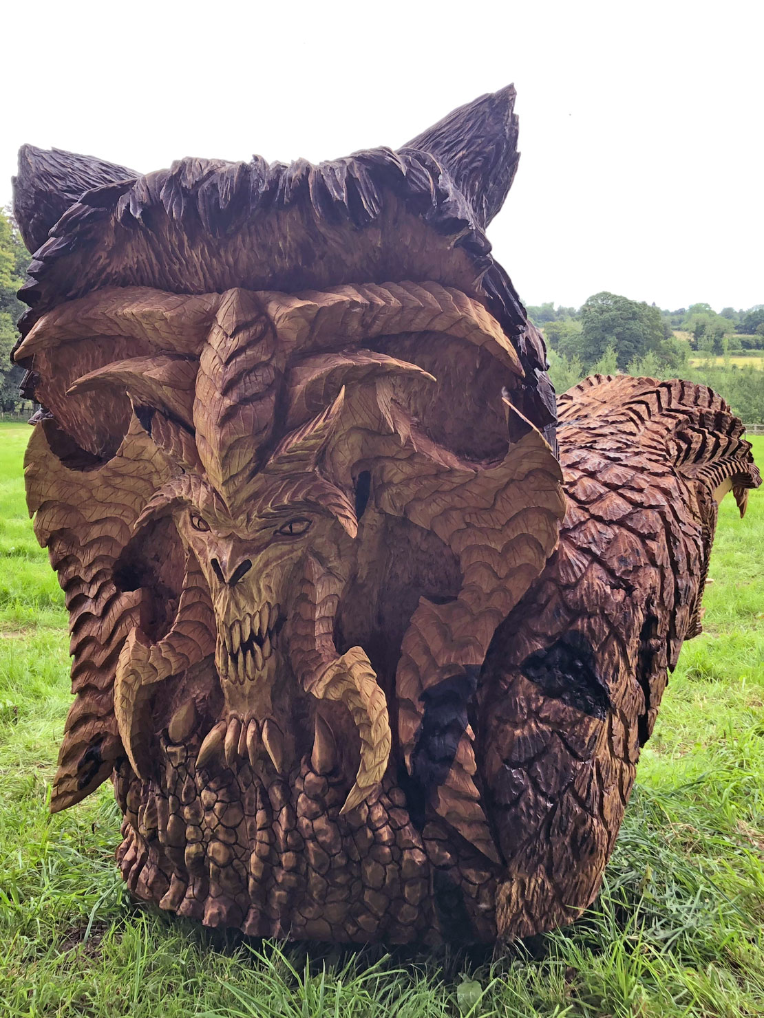 Bear snake head carving