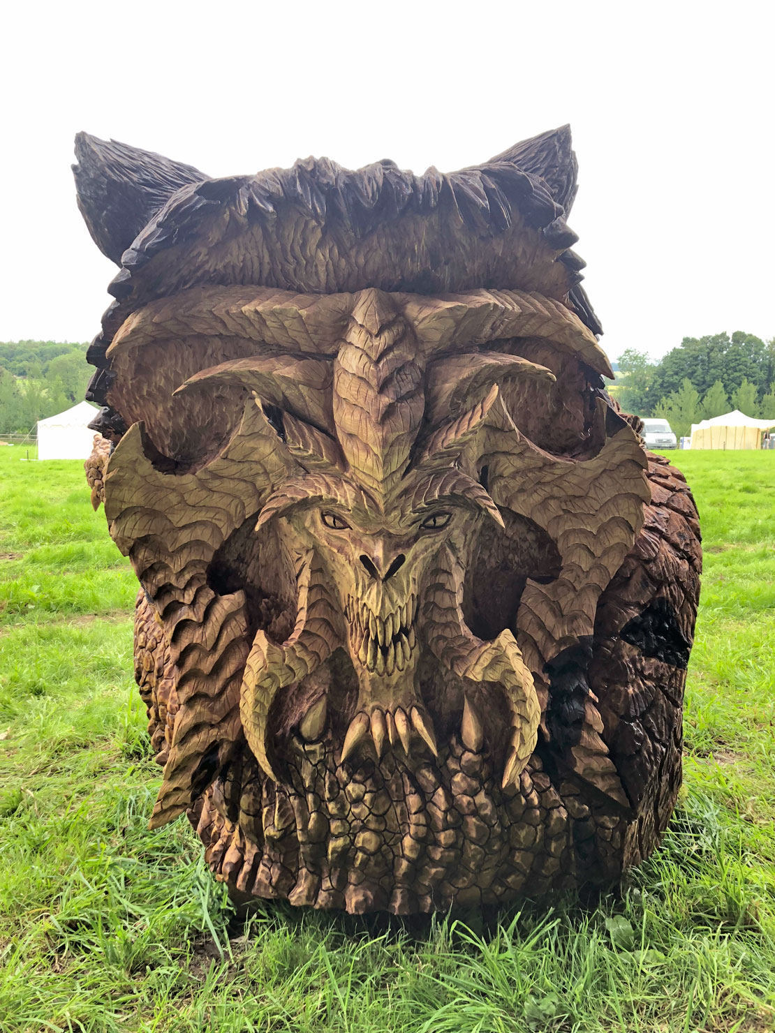 Bear snake head carving