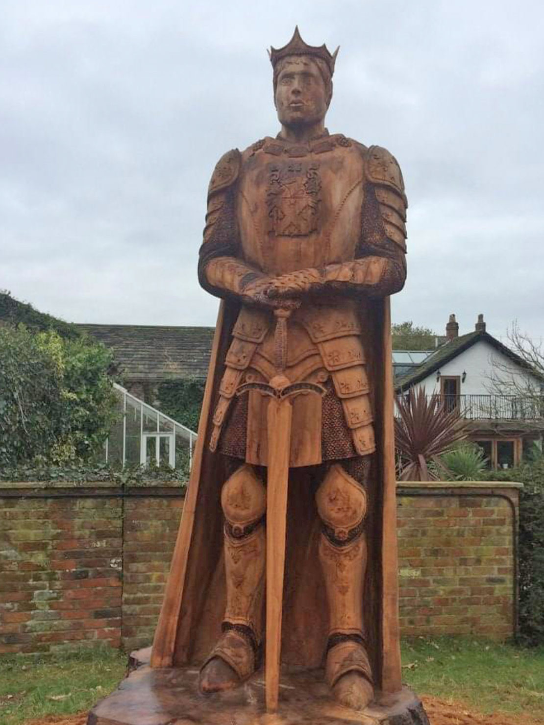 King Arthur wooden sculpture by Matthew Crabb