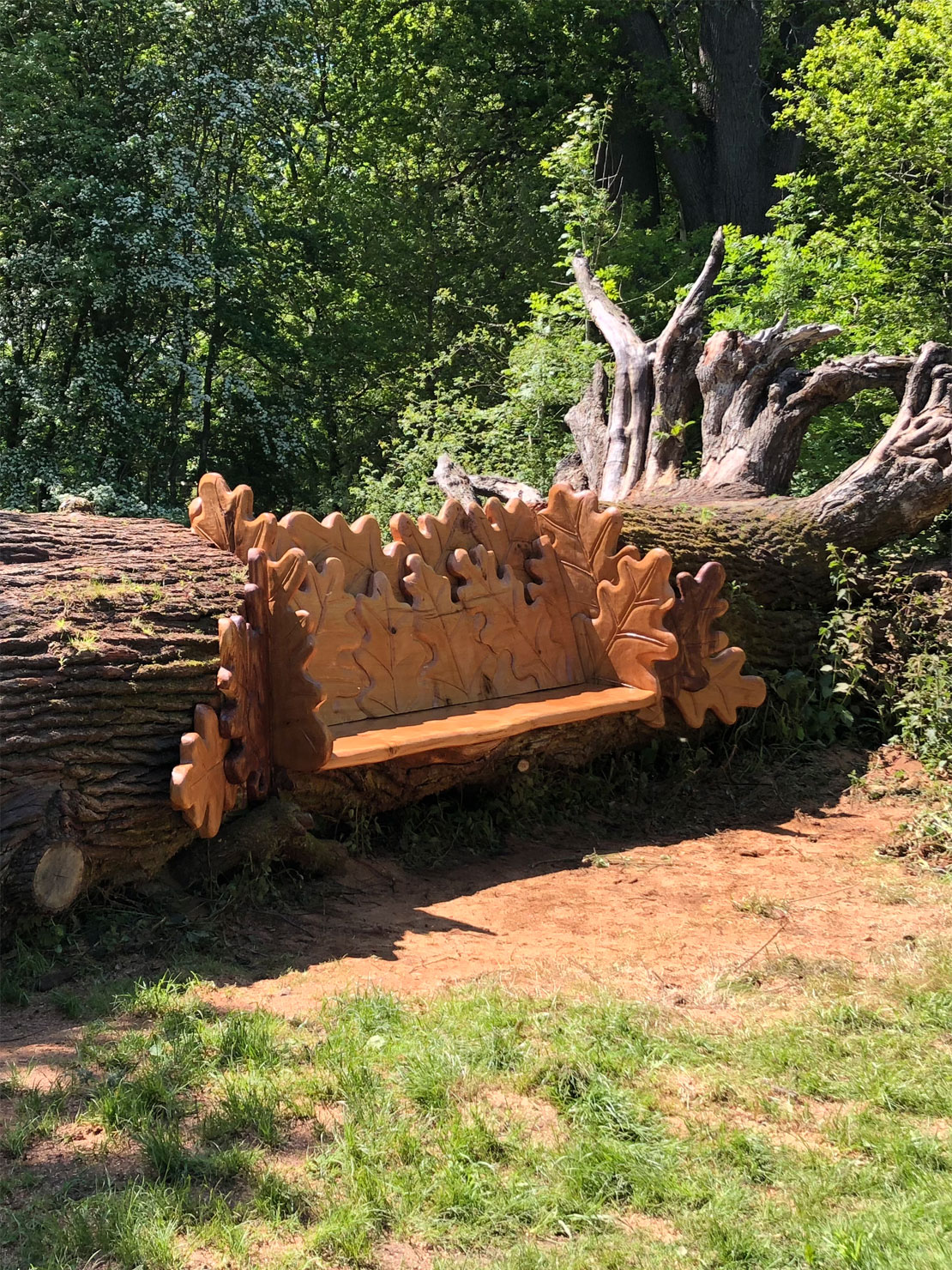 Carved oak bench with oak leaf design Carved oak bench with oak leaf design