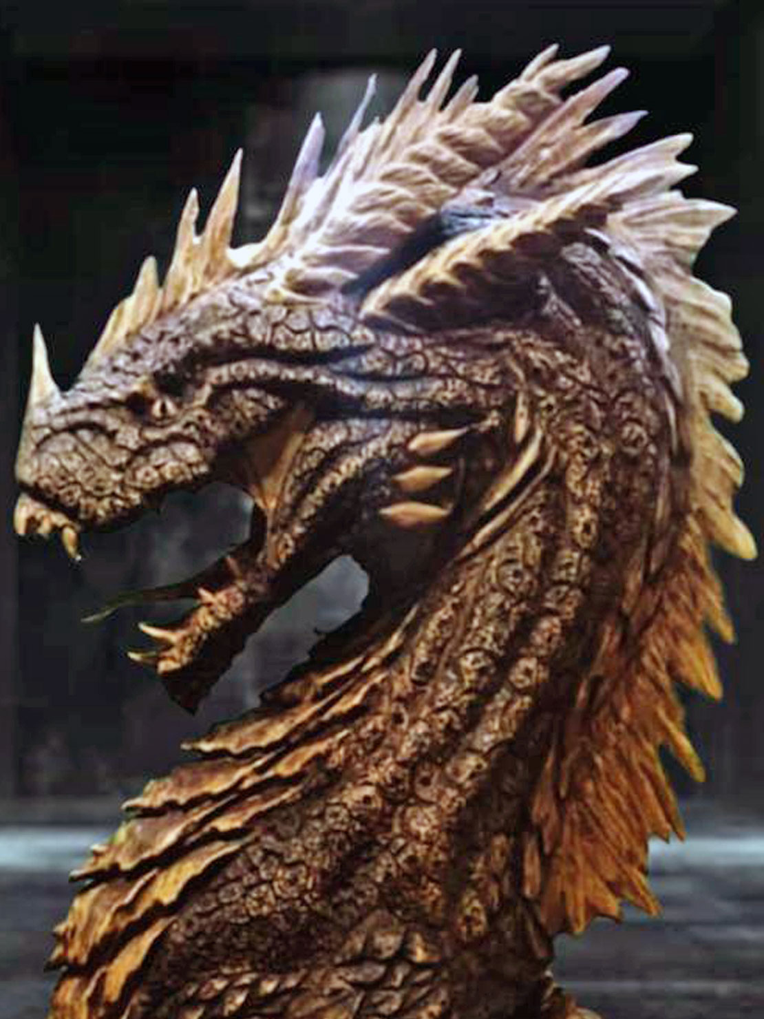 Carved wooden dragon with pale spikes