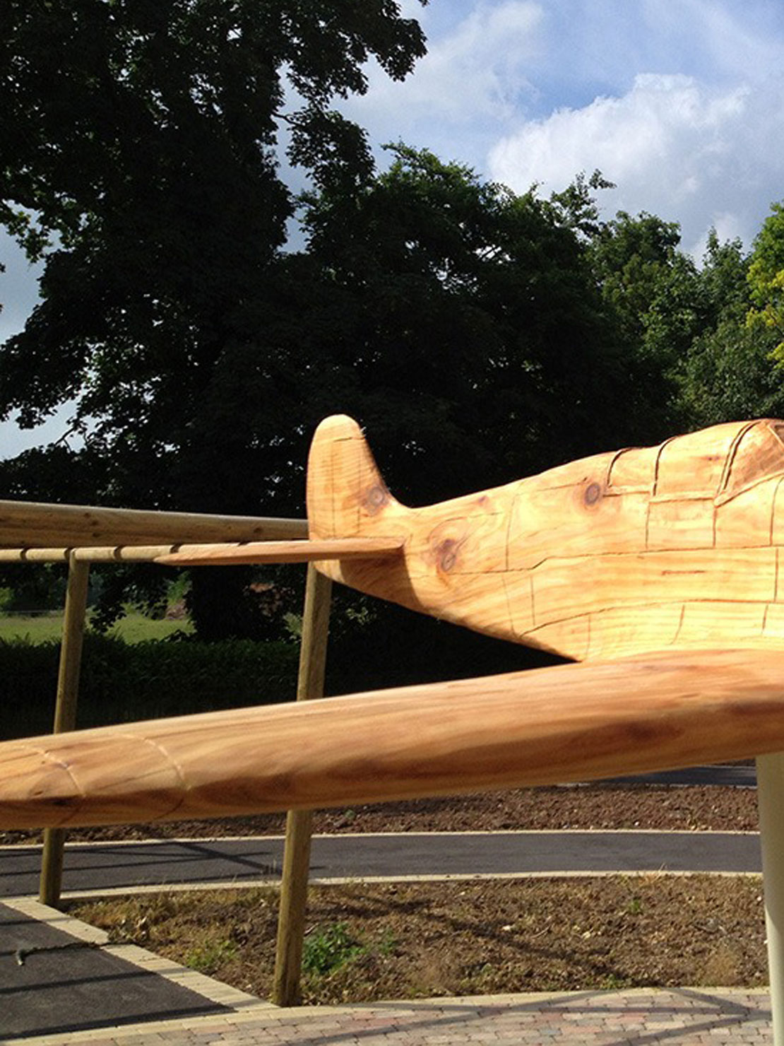 Carved wooden spitfires by Matthew Crabb