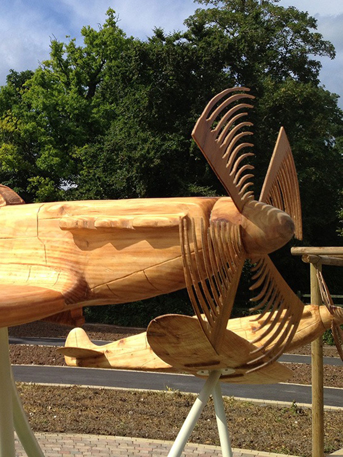 Carved wooden spitfires by Matthew Crabb