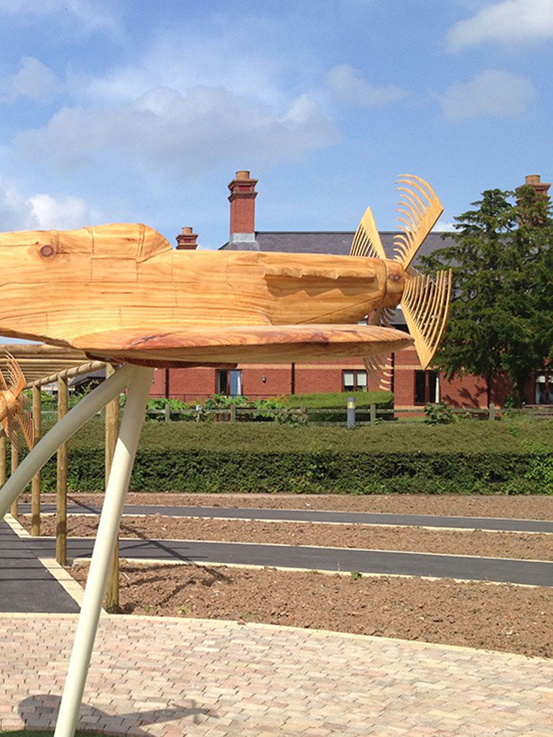 Carved wooden spitfires by Matthew Crabb