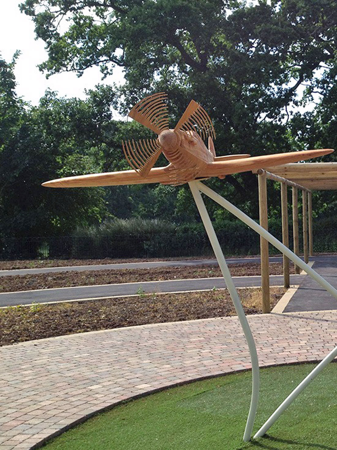 Carved wooden spitfires by Matthew Crabb