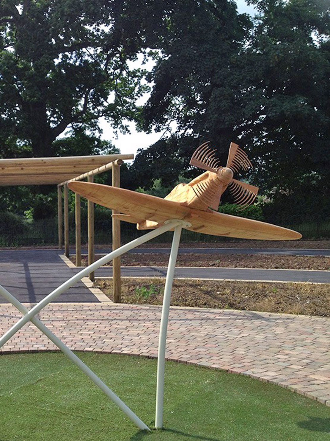 Carved wooden spitfires by Matthew Crabb