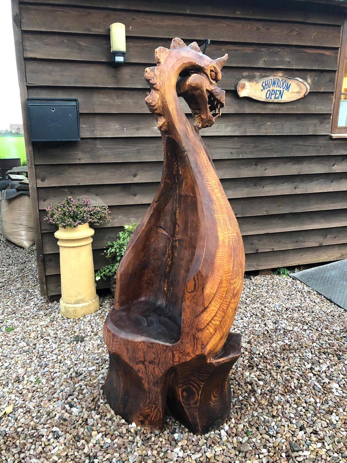 Viking Long boat throne carved by Matthew Crabb Tree Carving Artist