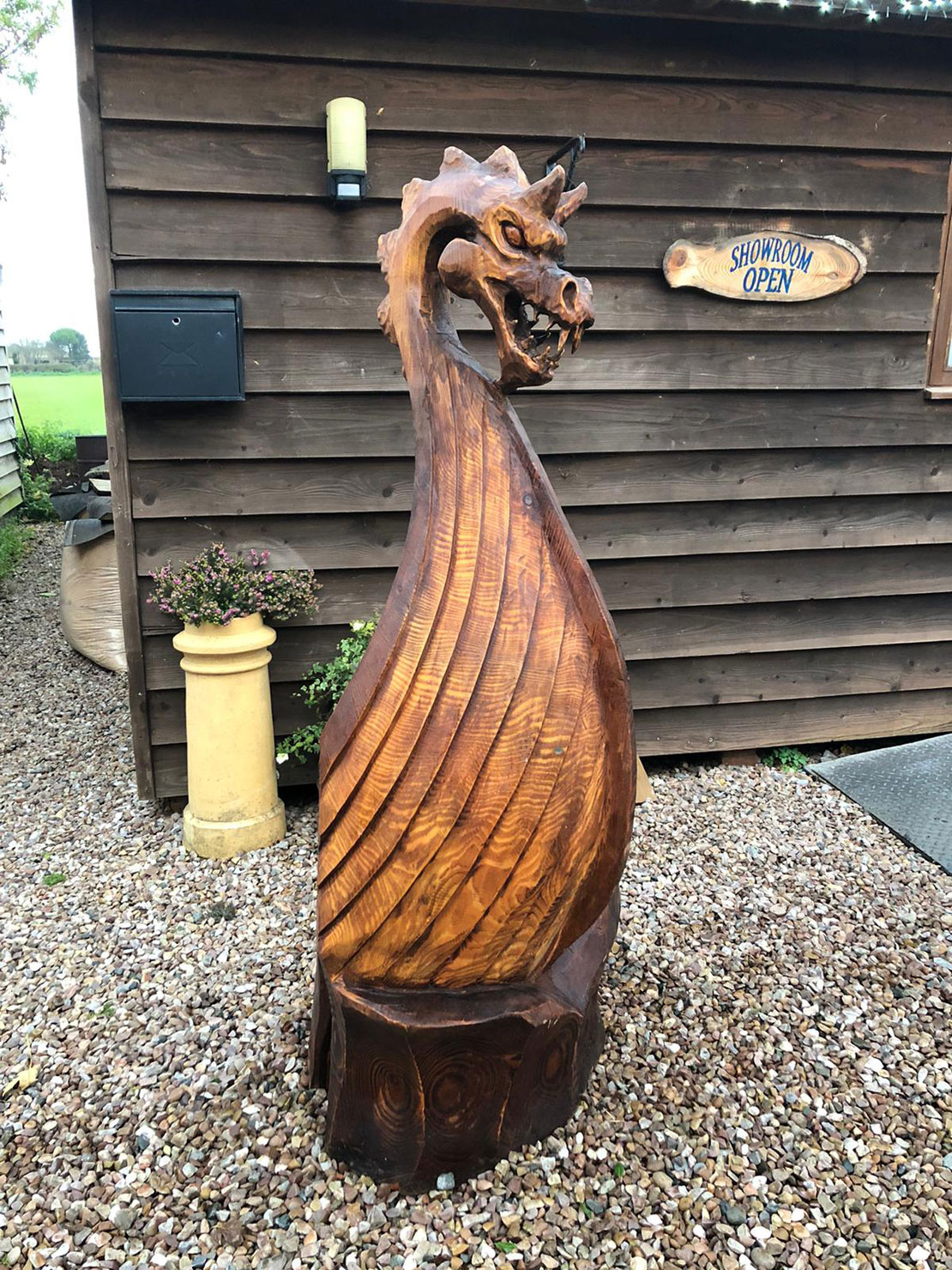 Viking Long boat dragon throne carved by Matthew Crabb Tree Carving Artist